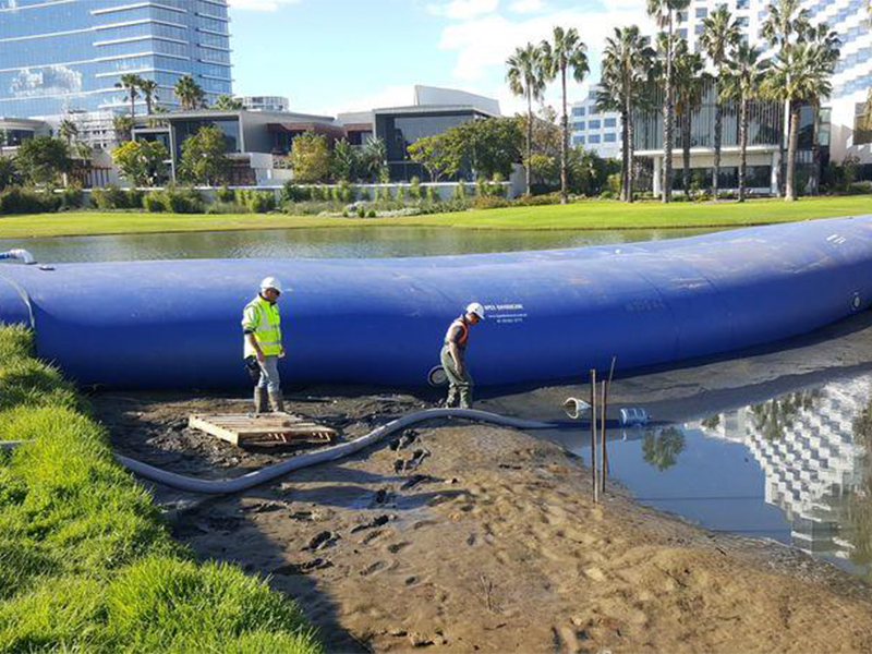 Water filled inflatable flood barrier could be used in construction or not?