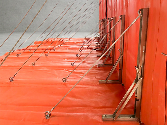 Flood barrier panel for temporary flood protection around buildings