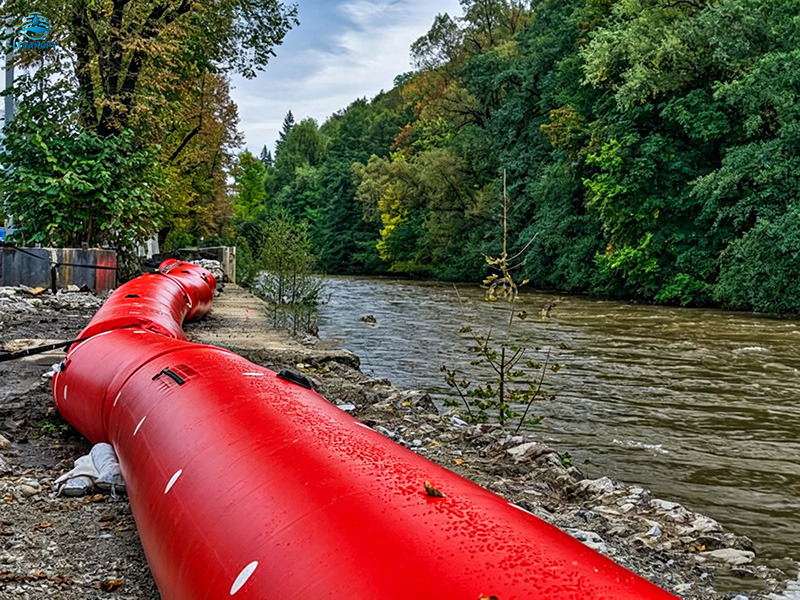 Inflatable flood tubes protecting riverbank