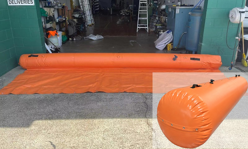 Orange circular flood barrier at doorway