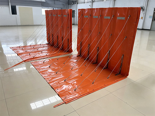 Flood barrier panel for temporary flood protection around buildings